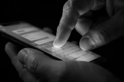 Monochrome Smartphone App Screen Close Up