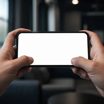 Hands Holding Smartphone with Blank Screen