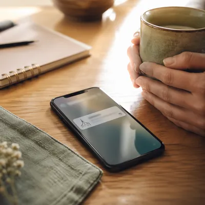 Smartphone Church App Notification at Breakfast