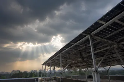Rooftop Solar Canopy Under Stormy Sky