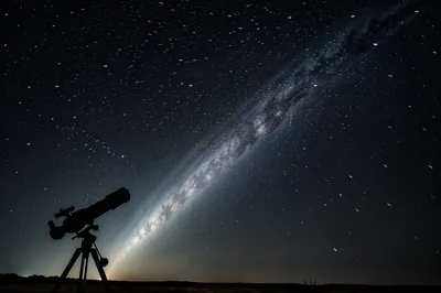 Telescope Under Starry Night Sky