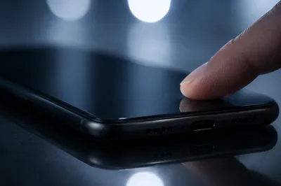 Finger Tapping Smartphone Touchscreen Close Up