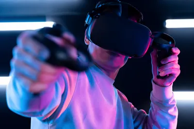 Person in VR Headset Reaching Forward