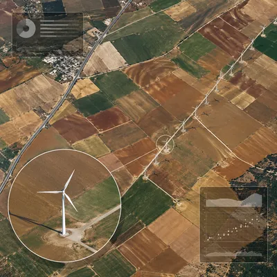 Aerial Wind Turbines Over Rural Farmland
