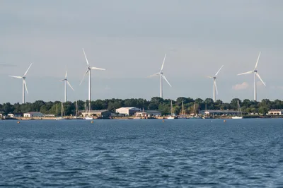 Coastal Wind Turbines Across Quiet Inlet