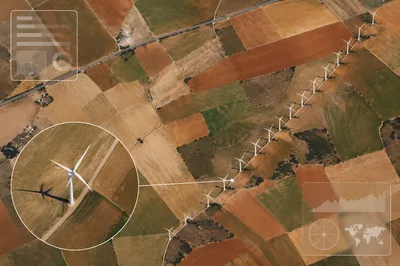Aerial Wind Turbines Across Farmland