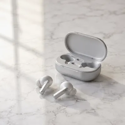 Minimal Wireless Earbuds on White Marble