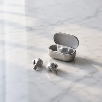Minimal Wireless Earbuds on White Marble
