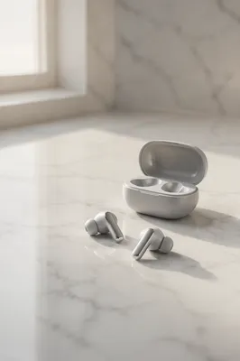 Minimal Wireless Earbuds on White Marble