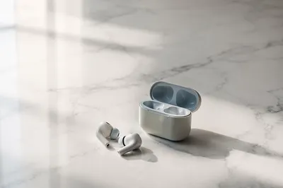 Minimal Wireless Earbuds on White Marble