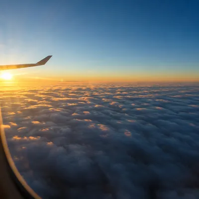 Golden Hour Flight Above Peaceful Clouds