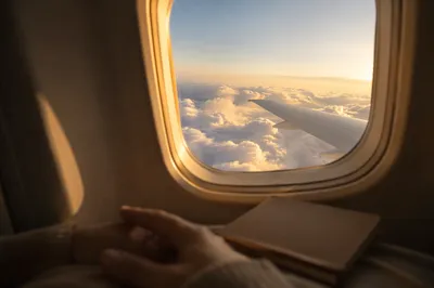 Peaceful Airplane Window View at Sunrise