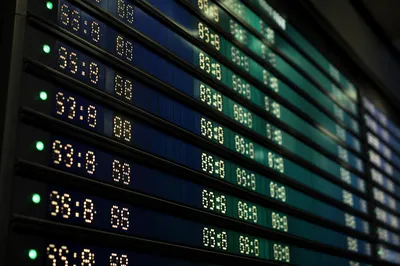 Airport Departure Board in Dim Terminal