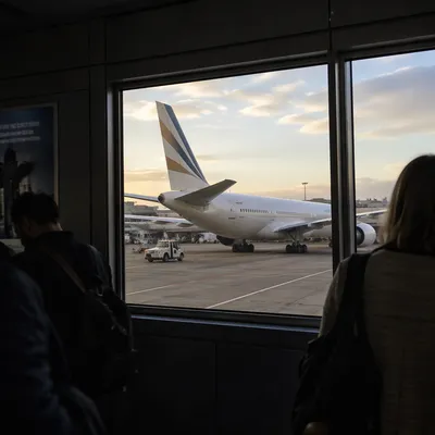Airport Lounge Window View of Parked Plane