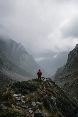 Lone Hiker on Misty Mountain Ridge