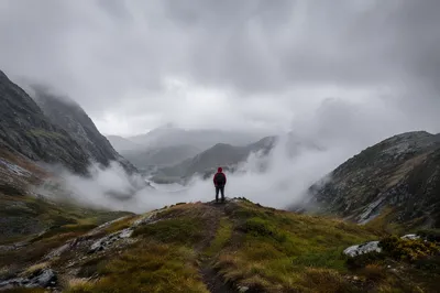 Lone Hiker on Misty Mountain Ridge