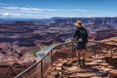 Lone Hiker Overlooking Desert Canyon Trail
