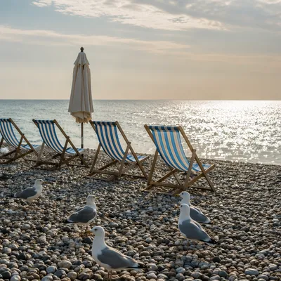 Quiet Pebble Beach Chairs with Ocean View