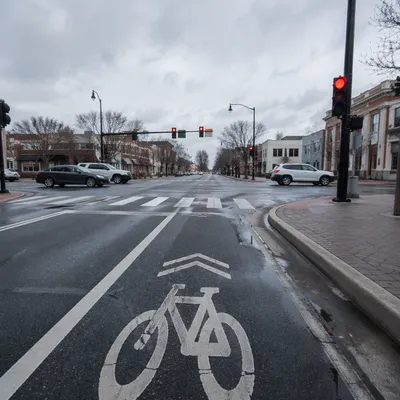 Urban Bicycle Commute at Overcast Intersection