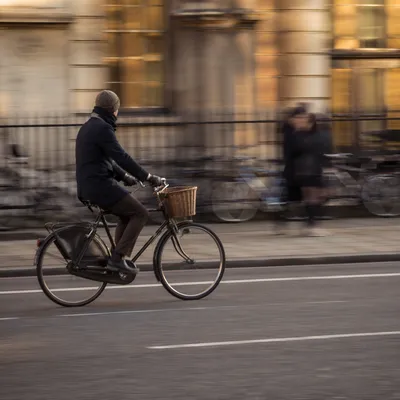 Vintage Bicycle Commuter on Urban Street
