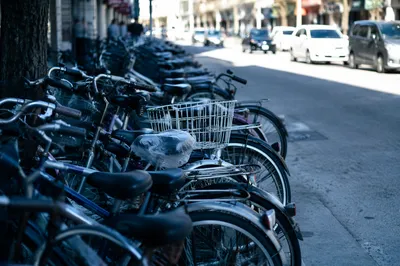 Urban Commuter Bicycles on Sunlit Sidewalk