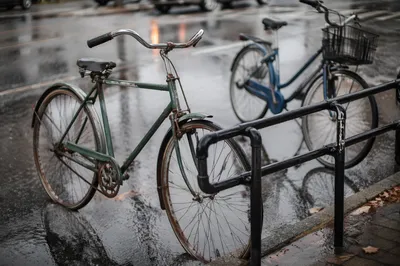 Rainy Urban Bicycle Commute on Wet Street
