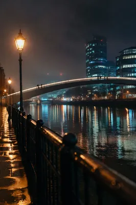 Night Pedestrian Bridge Over Urban River