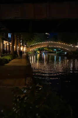 Glowing Bridge Over Quiet City River