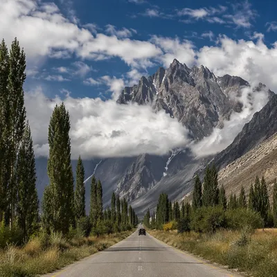 Scenic Highway Through Alpine Mountain Valley