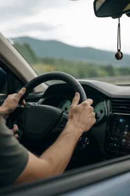 Hands on Steering Wheel Road Trip