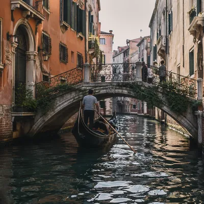 Gondola Beneath Venetian Stone Bridge