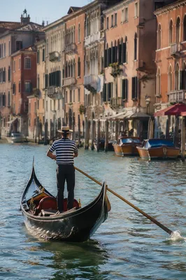 Venetian Gondola on Sunlit Canal