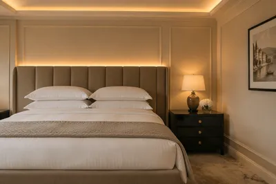 Luxury Hotel Room Bed with Warm Lighting