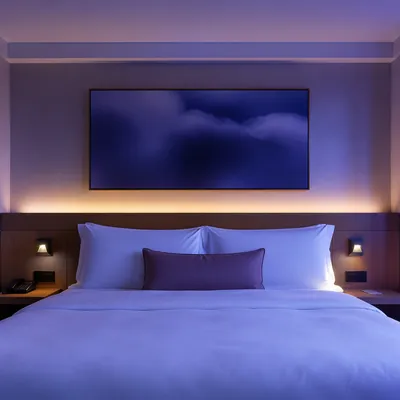Luxury Hotel Bed in Evening Light