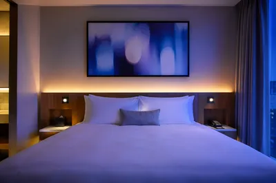 Luxury Hotel Bed in Evening Interior