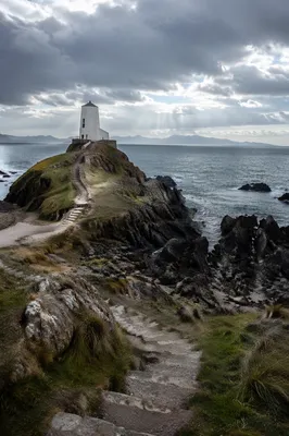 Remote Lighthouse on Stormy Rocky Coast