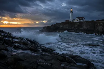 Dramatic Lighthouse on Rocky Ocean Coast