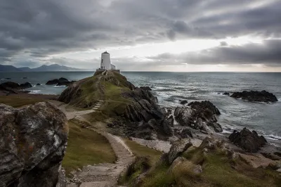 Remote Lighthouse on Stormy Rocky Coast