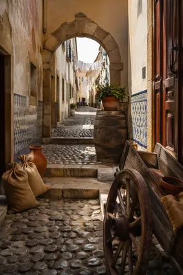 Narrow Cobblestone Passage in Old European Town