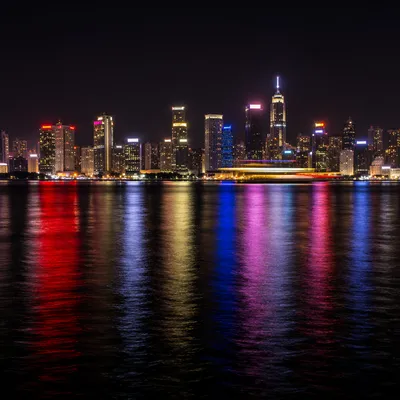 Modern Night Skyline Across Harbor