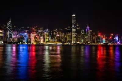 Modern Night Skyline Across Harbor