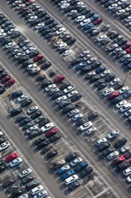 Aerial Travel Parking Lot With Neat Car Rows