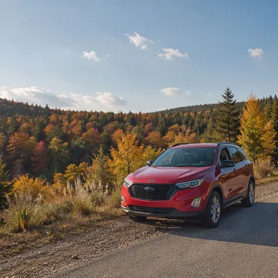 Red SUV on Autumn Country Road