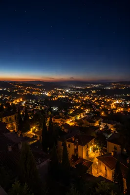 Panoramic Rooftop Cityscape at Evening Lights