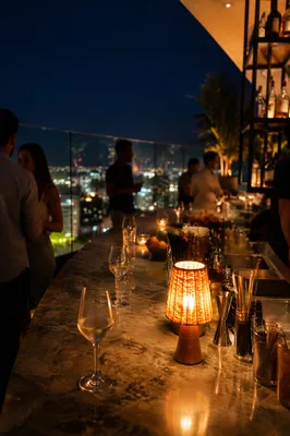 Evening Rooftop Bar Over City Lights
