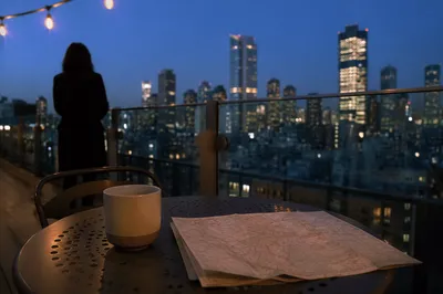 Blue Hour Rooftop Cityscape with Evening Lights