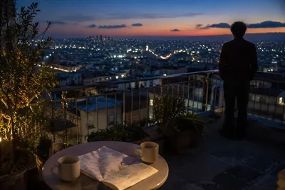 Blue Hour Rooftop Cityscape with Evening Lights