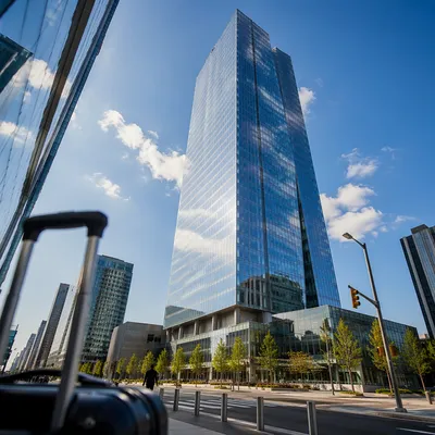Glass Skyscraper Reflecting Morning Travel Sky