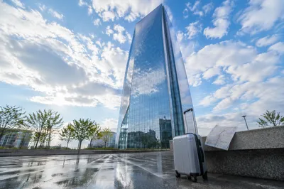 Glass Skyscraper Reflecting Spring Clouds