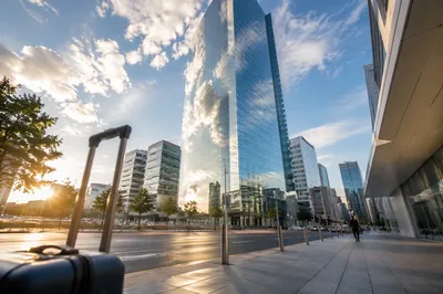 Glass Skyscraper Reflecting Morning Clouds